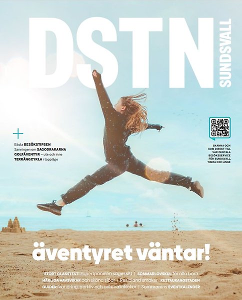Bild av framsidan av ett magasin. En person hoppar på en strand.